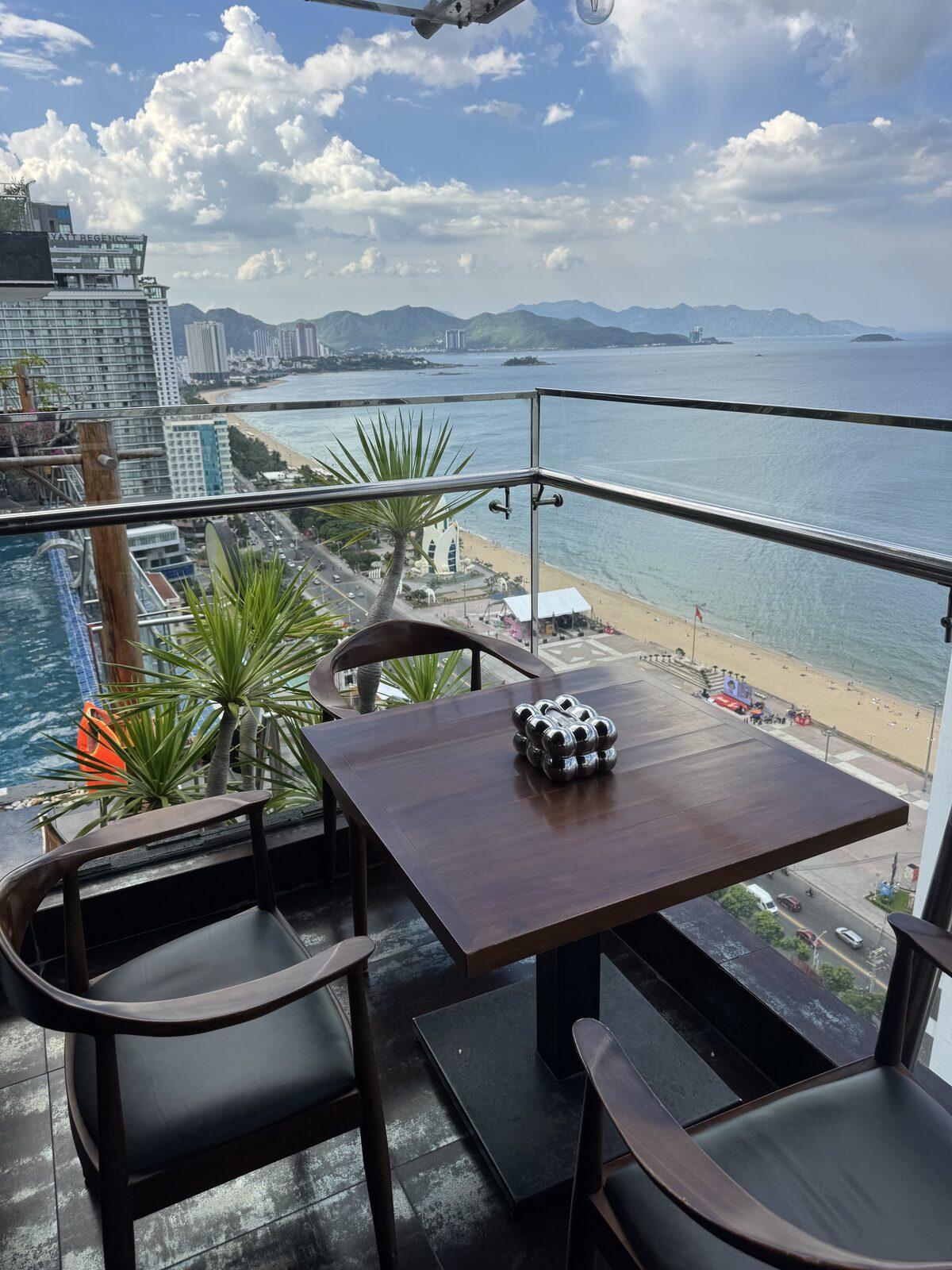 Terrace table with a view over Nha Trang bay from the 25th floor